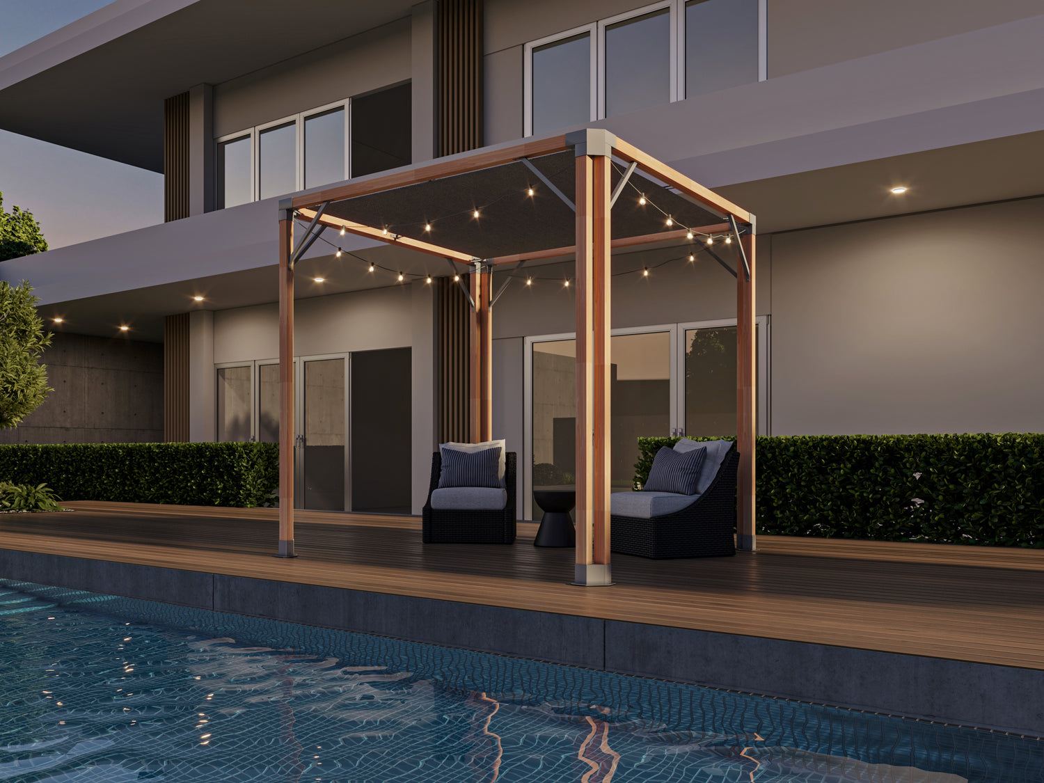 Lighted CedarCraft Bali Pergola poolside with comfy chairs to help you stay out of the sun.